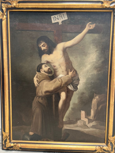 Abrazo del crucificado a San Francisco de Asís.
