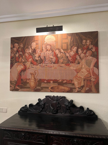 Antiguo tapiz representando la Santa Cena.
