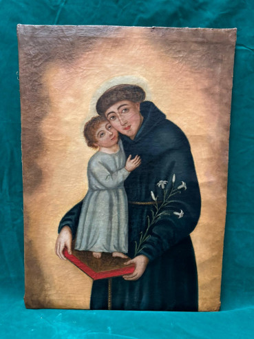 San Antonio con niño Jesús sobre la biblia.