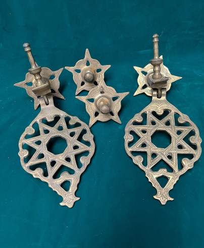 Llamadores en bronce con decoración cincelada a mano con estrella