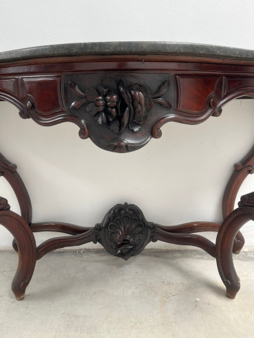 Elegante consola isabelina en madera de palo...