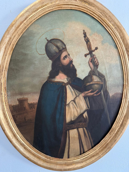San Fernando sobre óleo en marco ovalado dorado.