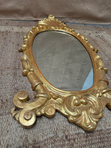 Elegante espejo tallado en madera y dorado en oro fino. 2