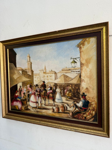 Escena goyesca con mercado al fondo y cartel de posada en lado derecho.