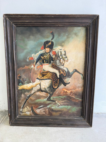 Retrato de Napoleón a caballo con espada en mano, óleo sobre tabla con gran marco.