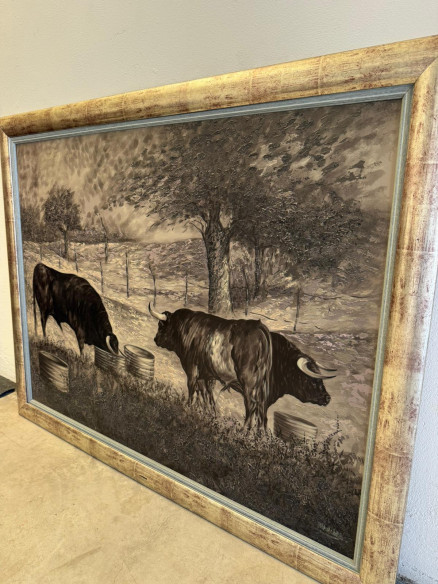 Toros bravos en el campo, pintados sobre tabla por Juan Lara.