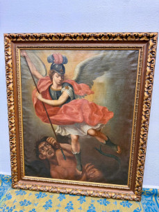 El Arcángel Miguel derrotando al demonio.