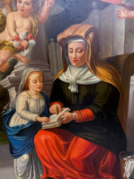 Santa Ana enseñando a leer a su hija la Virgen María, acompañada por ángeles, (firmado).