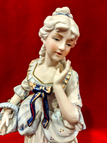 Pareja de figuras de porcelana alemana